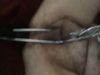 Short homemade anal pegging clip features guy with his ass stuffed and balls being punished